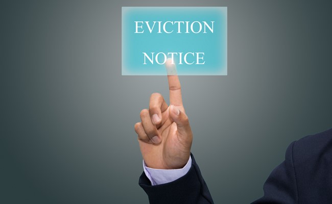 Houston property management company posting eviction notice